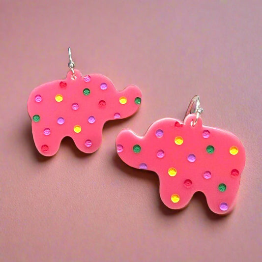 Pink acrylic elephant shaped earrings with painted round sprinkles with silver dangle earring hardware