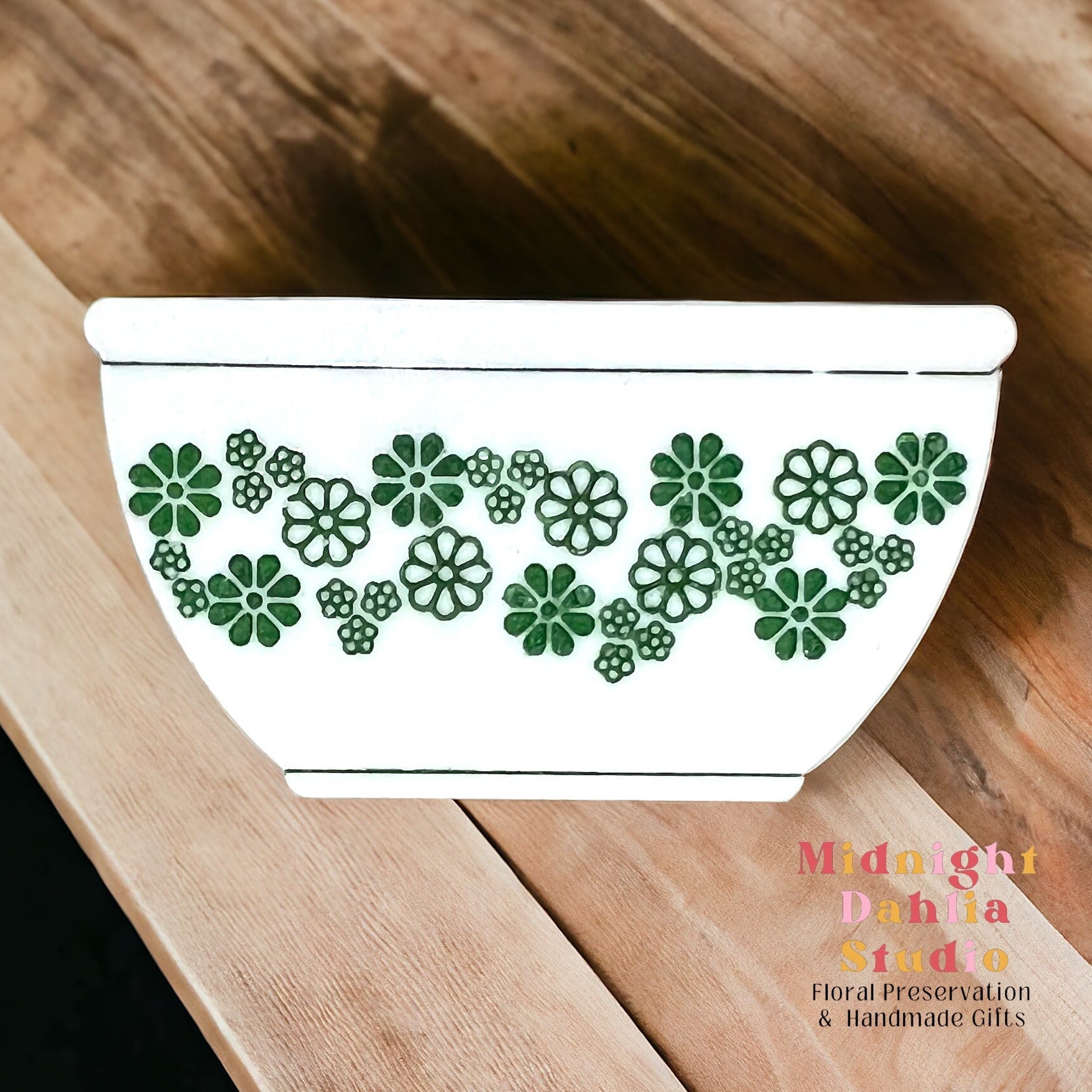 white bowl-shaped magnets that resemble vintage pyrex and corelle bowls