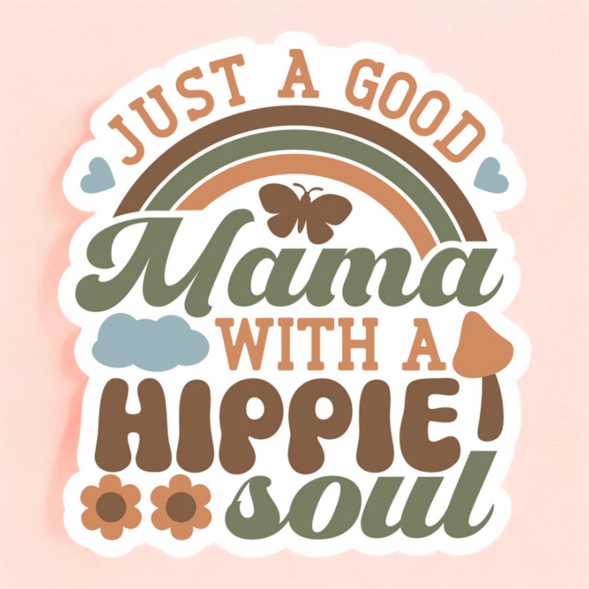 a white background sticker that reads just a good mama with a hippie soul in vintage colors of burnt orange, olive green, and brown, surrounded by a rainbow, butterflies, mushrooms, daisies, and hearts