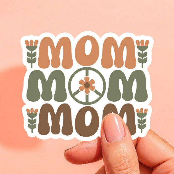 a sticker that reads mom three times in a retro style