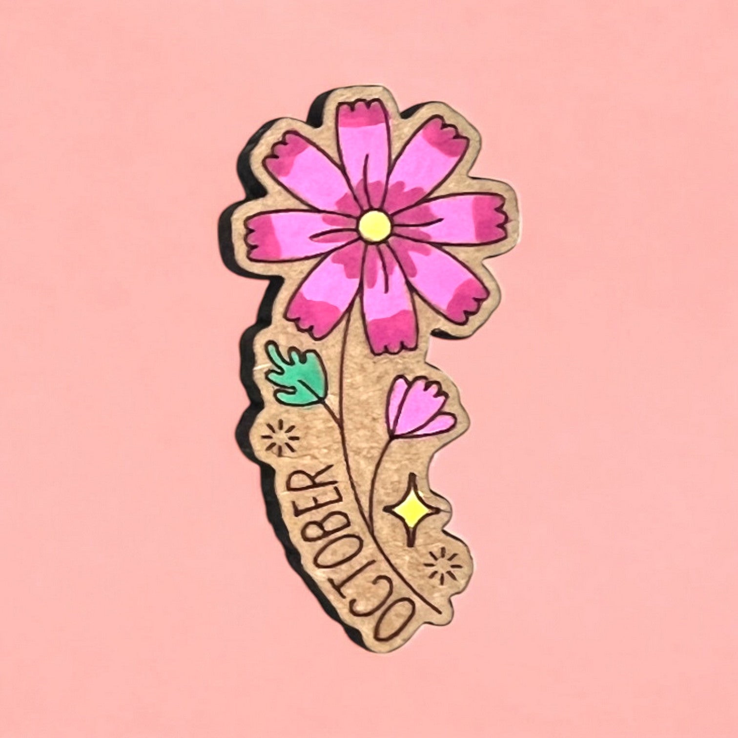 magnet with a cartoon style flower of each birth flower with the month typed on it, all hand-painted and laser cut