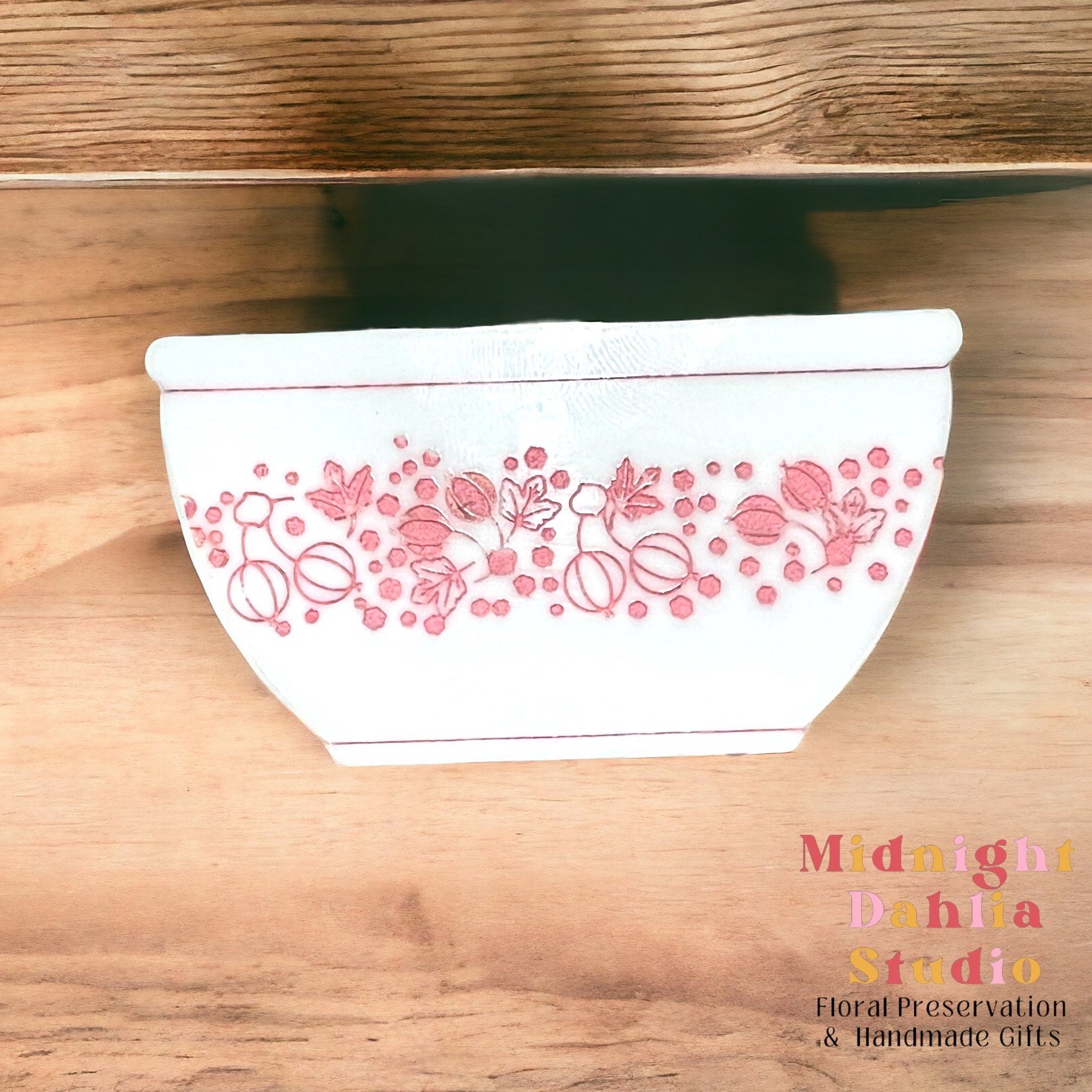 white bowl-shaped magnets that resemble vintage pyrex and corelle bowls