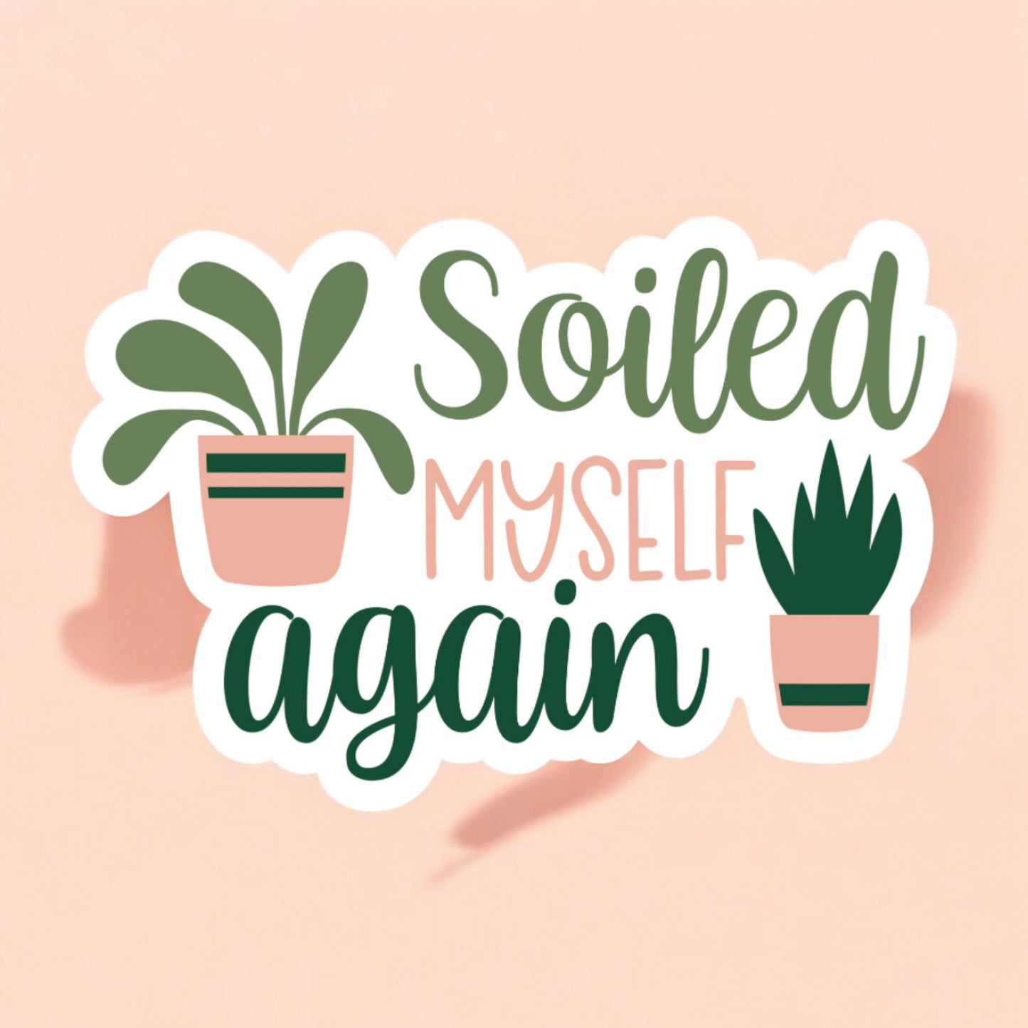 a white sticker that reads soiled myself again with two potted plants in green and peach light brown