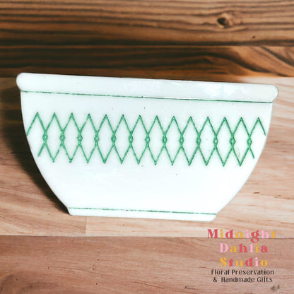 white bowl-shaped magnets that resemble vintage pyrex and corelle bowls